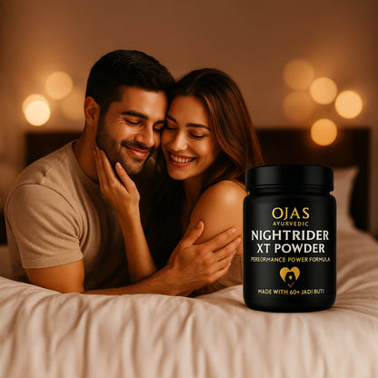 Couple embracing on a bed with a bottle of Ojas Ayurvedic Nightrider XT Powder in the foreground.